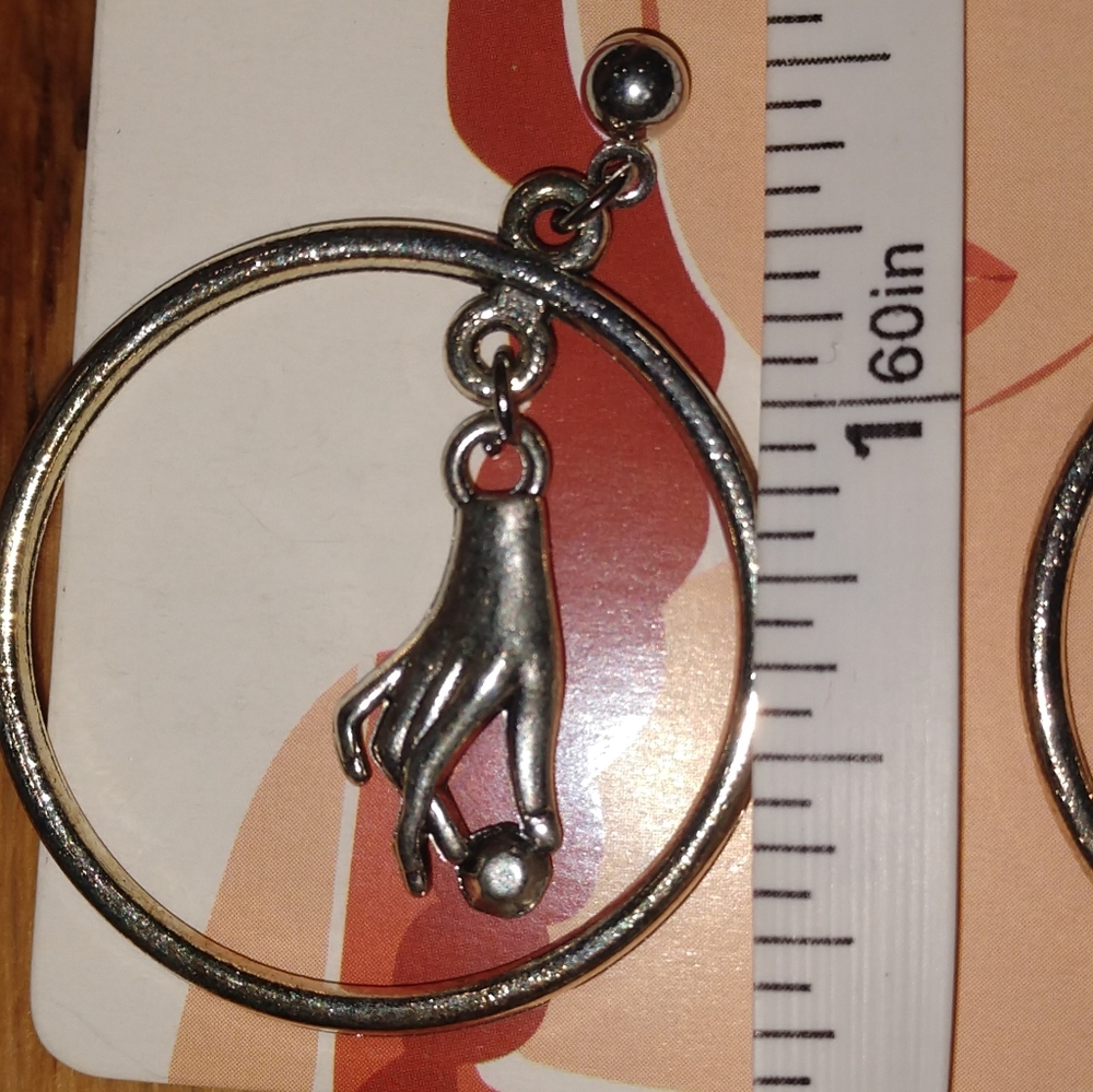 Silver hoop earrings with hands